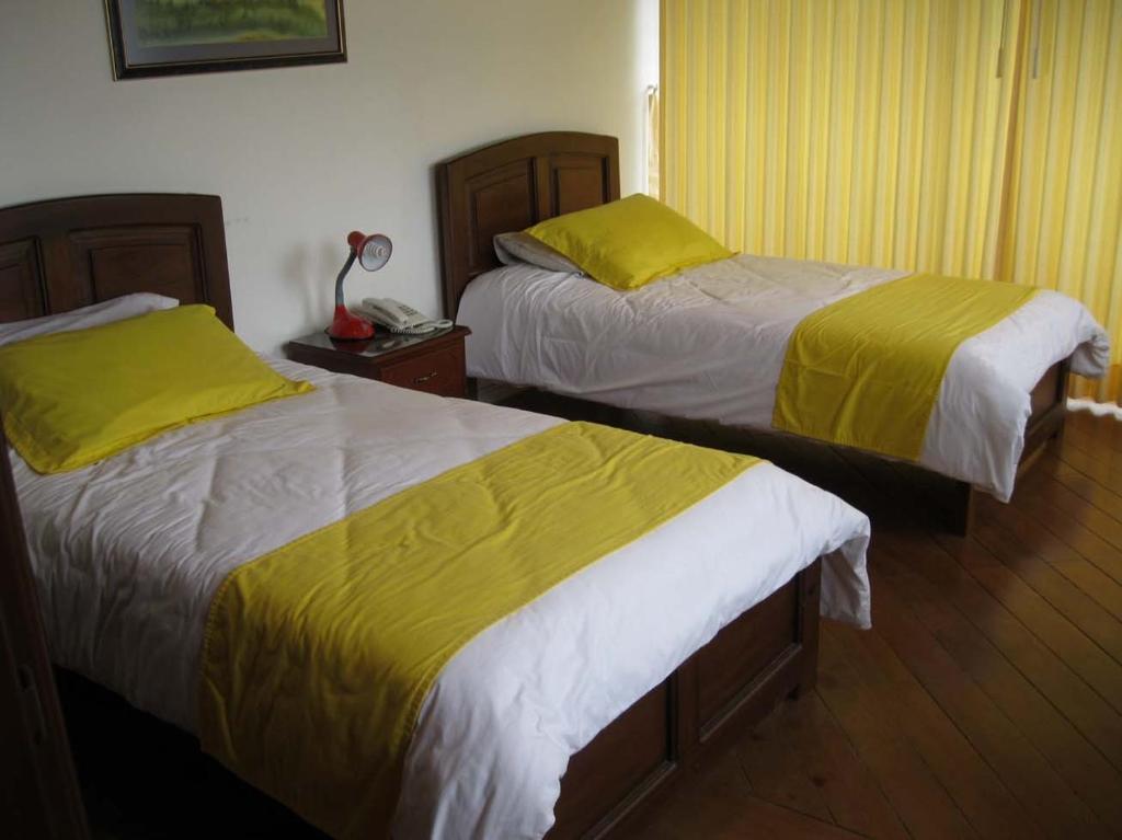 Hotel Rincón Escandinavo Quito Habitación foto